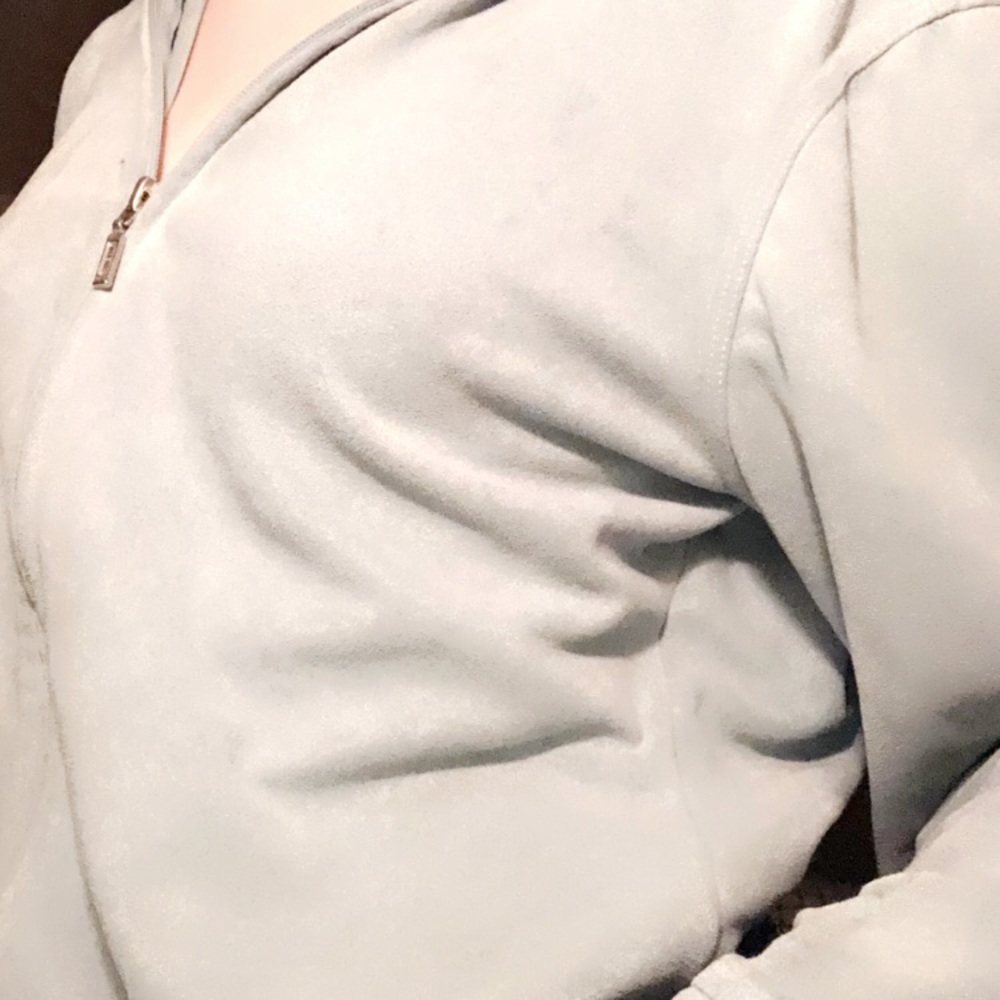 an cropped sage green hoodie